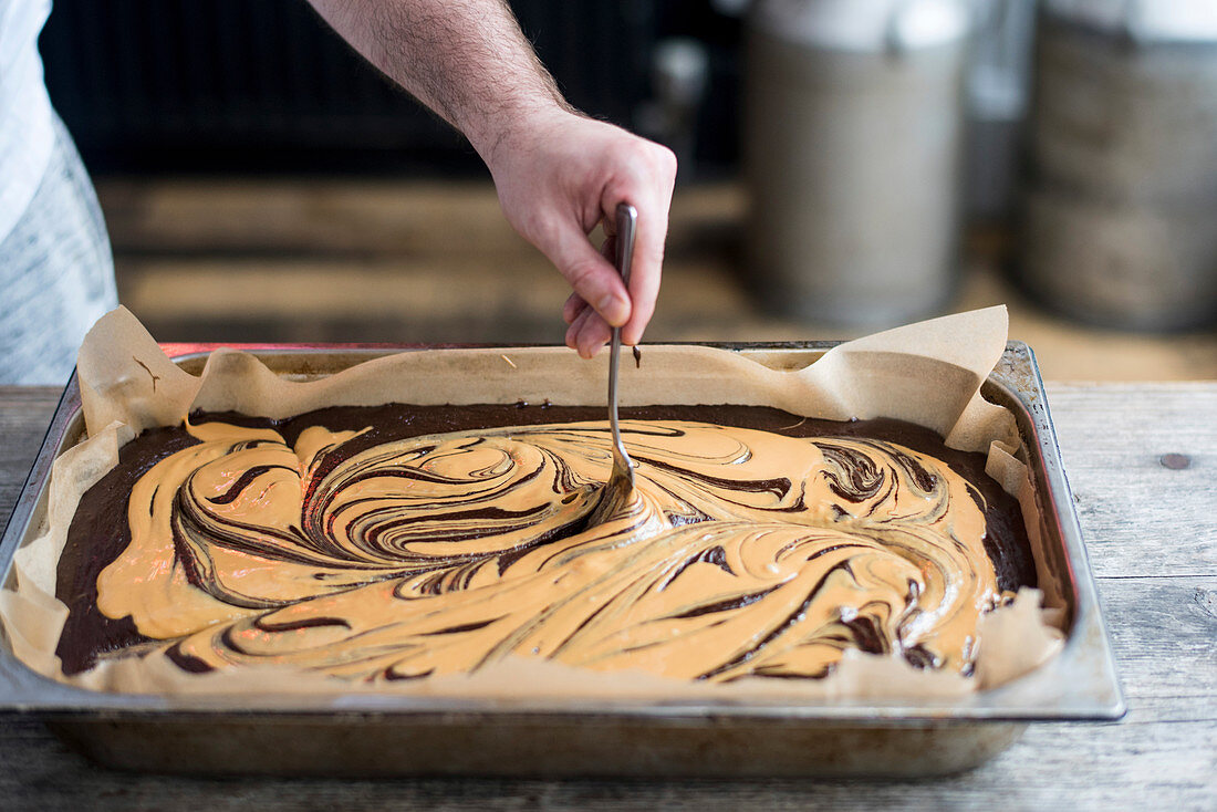 Preparing chocolate and peanut butter brownies