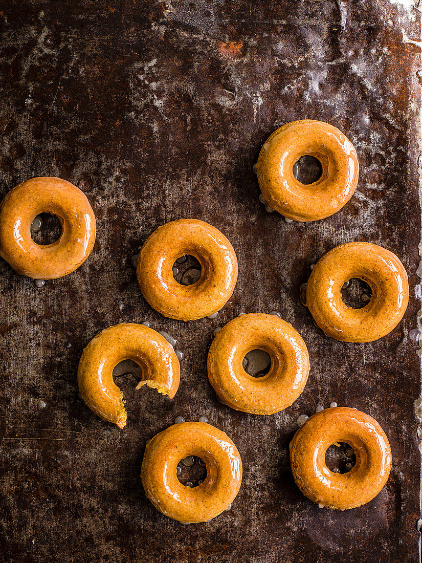 Pumpkin spiced doughnuts with salted maple glaze