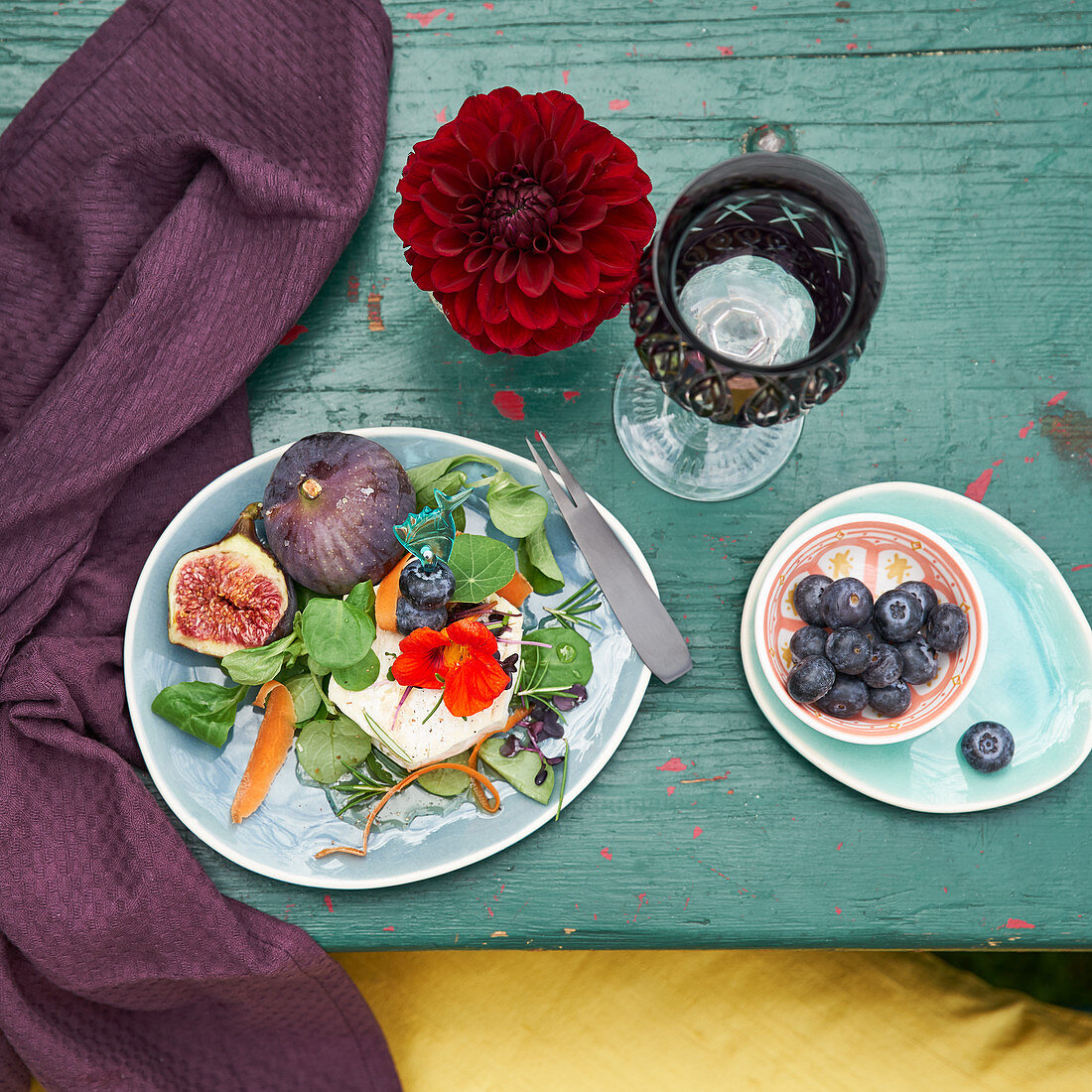 Fig and mozzarella salad with nasturtiums and blueberries