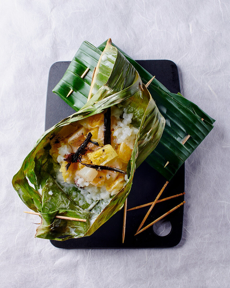 Sticky rice with pineapple in a banana leaf