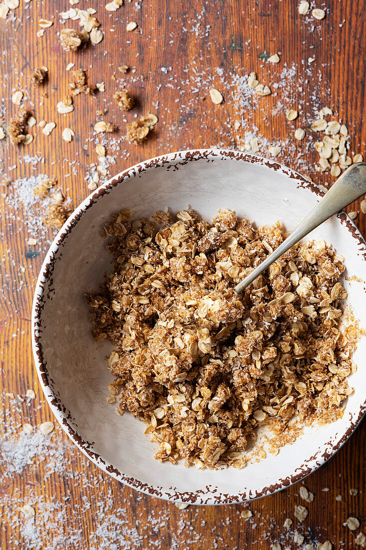 Oat crumble mixture in a bowl