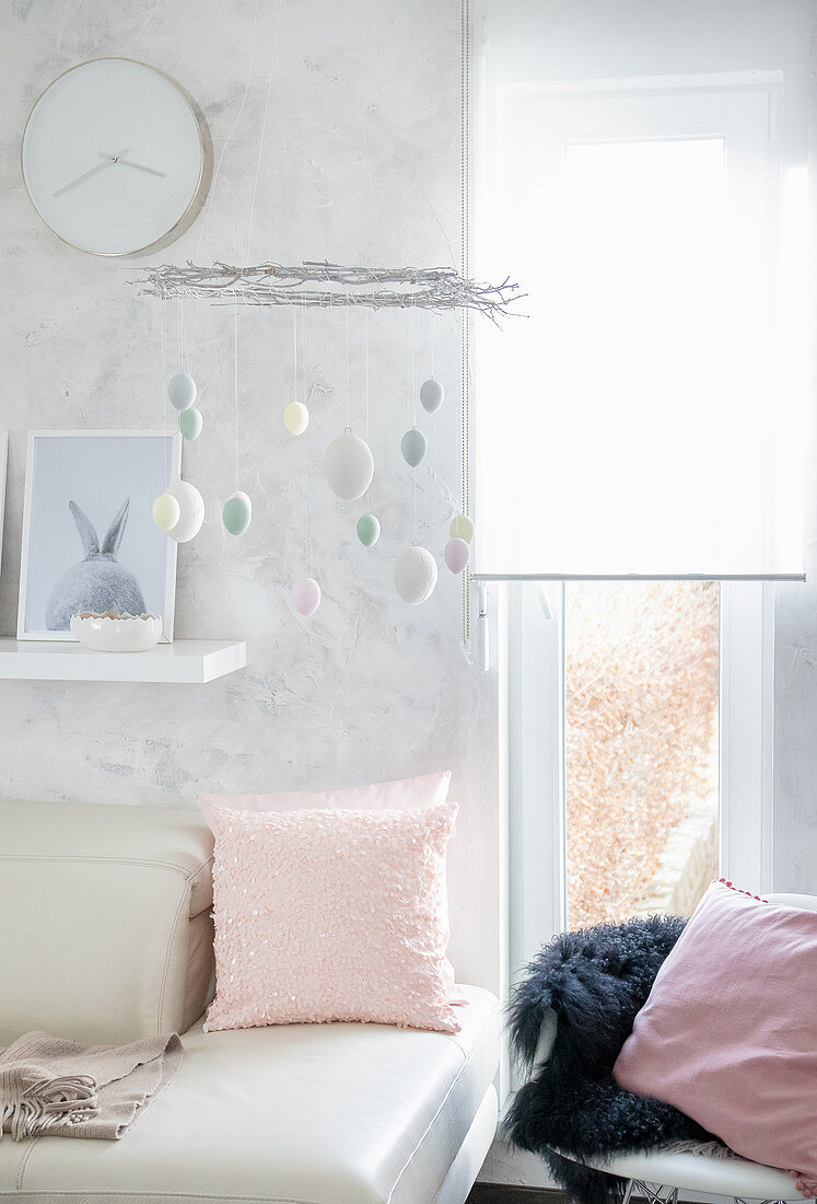 DIY Easter mobile decorated with pastel-coloured eggs