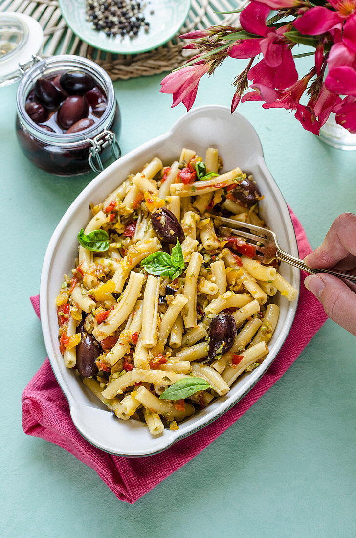 Pasta salad with vegetables and black olives