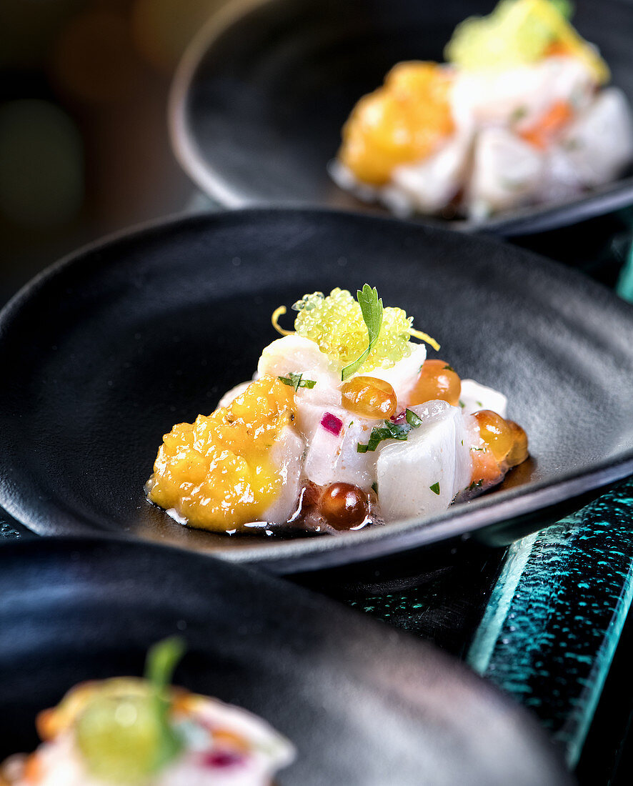 Sophisticated corvina fish ceviche served with sweet potato cream and tobiko or flying fish caviar