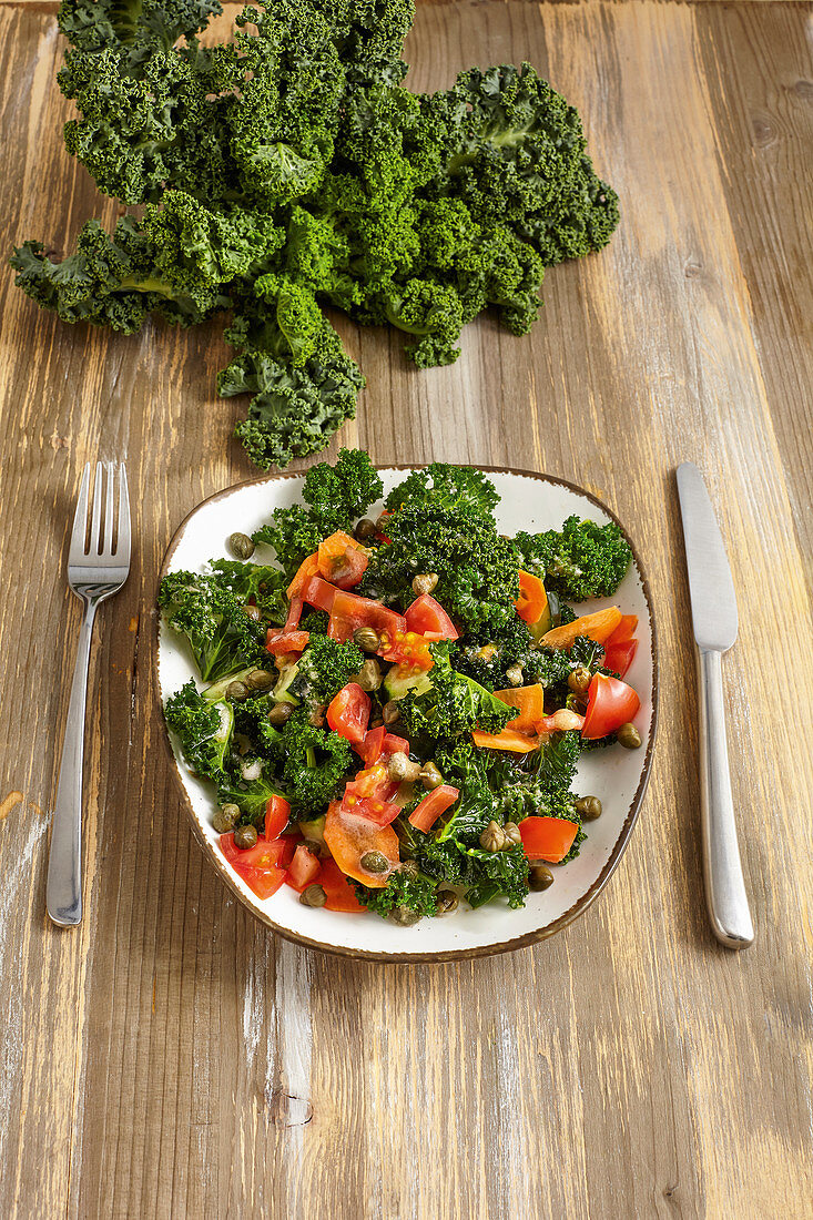 Kale salad with capers and date dressing