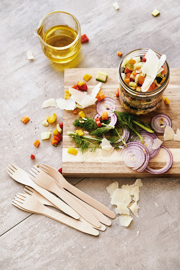 Legume salad with vegetables and parmesan in a glass