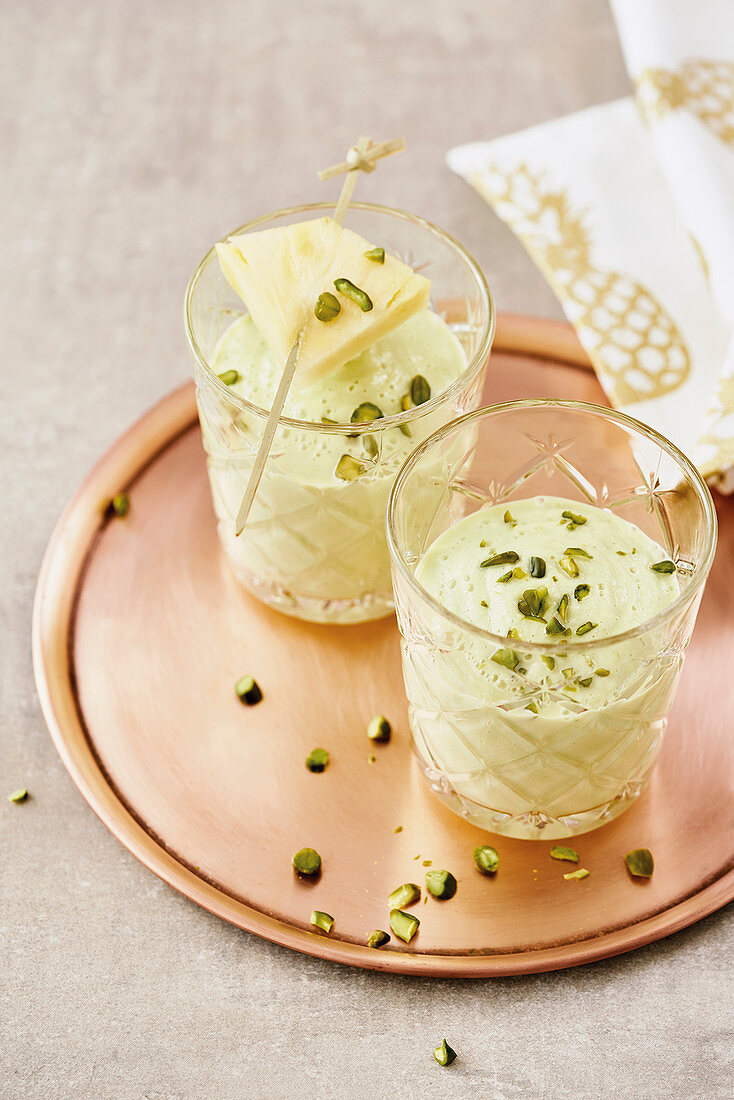 Pineapple and avocado smoothies with pistachios