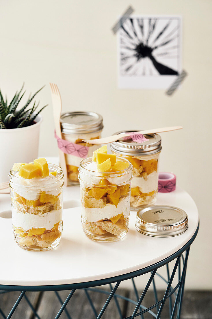 Cheesecake with Mango in take away jars