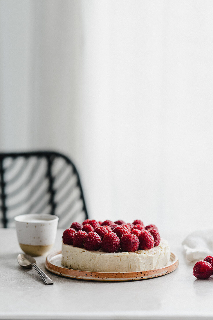 Vegan cashew cheesecake with raspberries