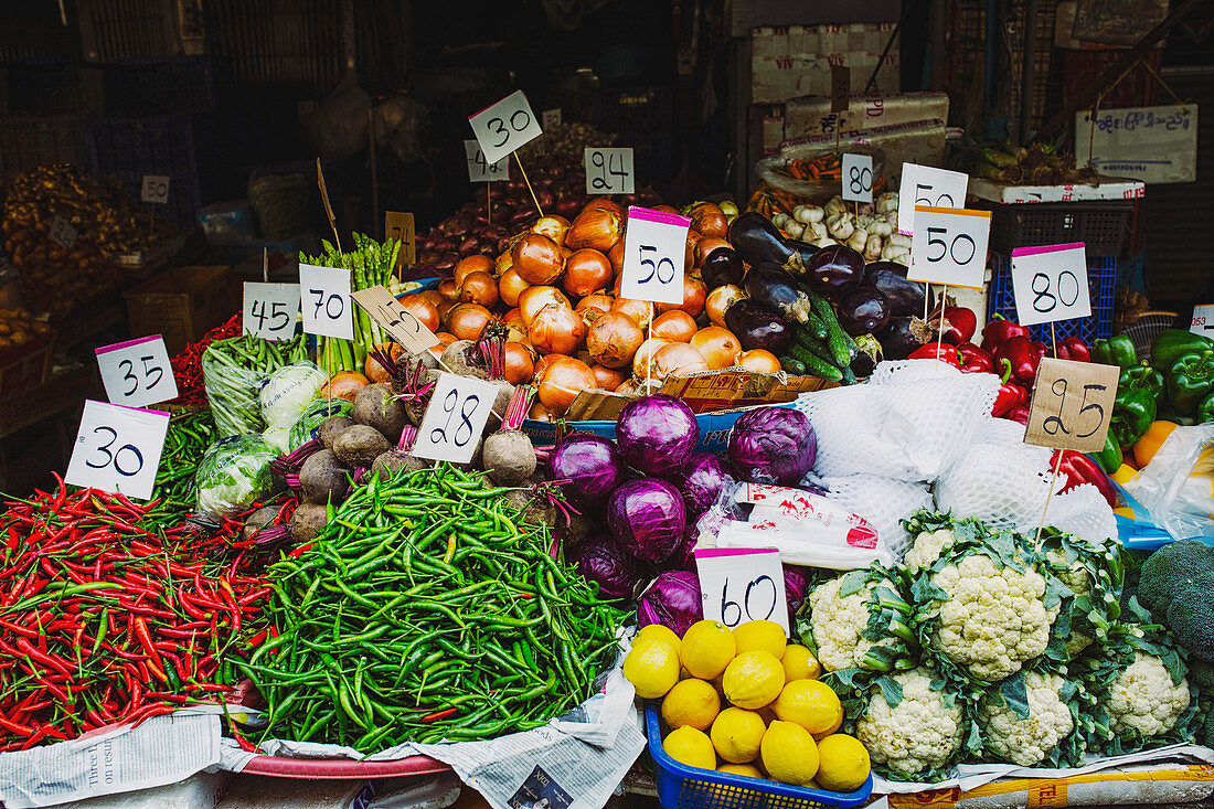 Vegetable stand at the Khlong Toei Market in Bangkok (Thailand)