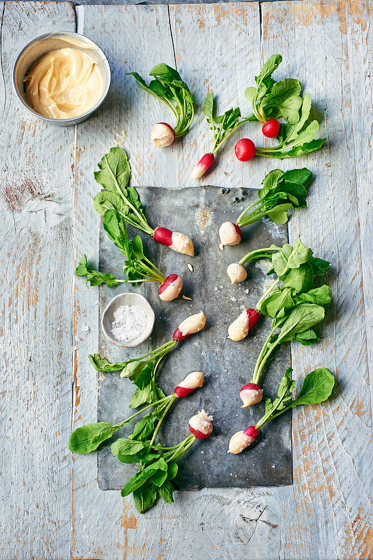 Radishes dipped in brown butter