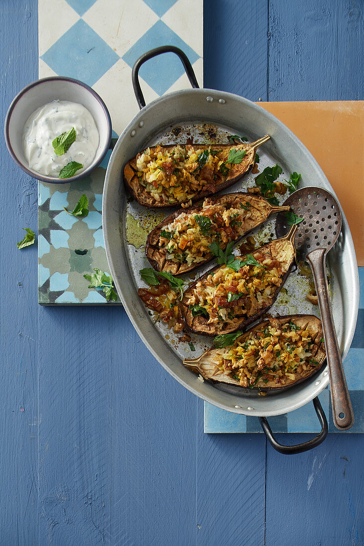 Stuffed aubergines with rice, turmeric, nuts and dates