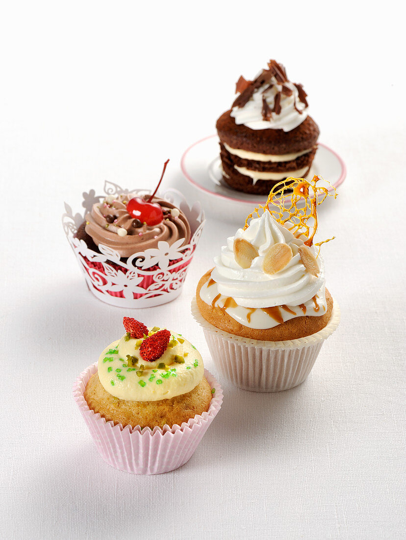 Various chocolate cupcakes, almond and pistachio cupcakes