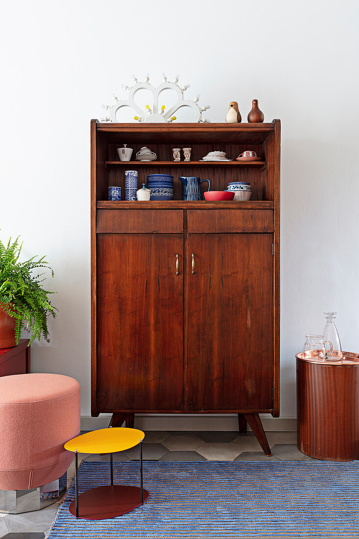 Crockery in a 1950s wooden cupboard