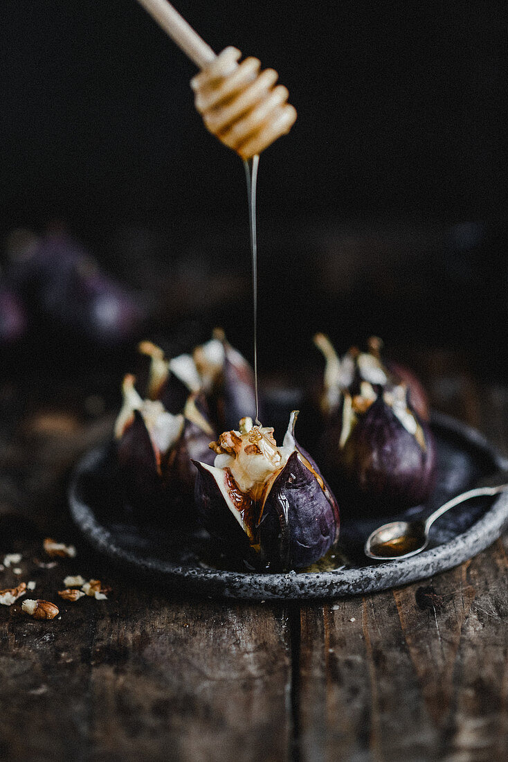 Figs baked with goat cheese walnuts and honey