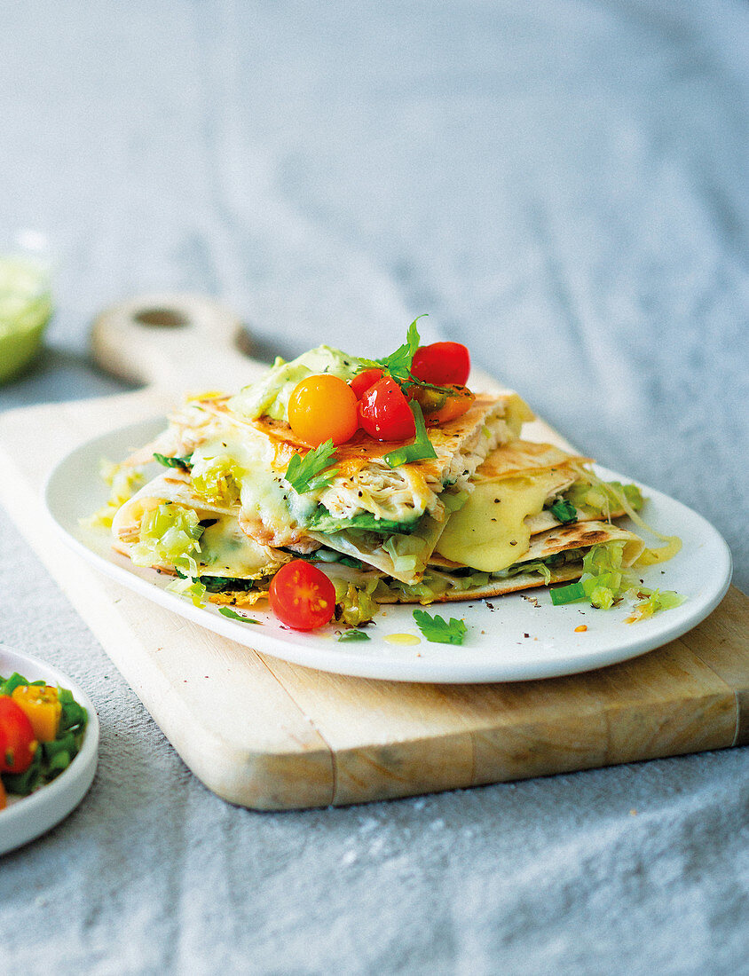 Cheesy caramelised leek and chicken quesadillas with avocado dip