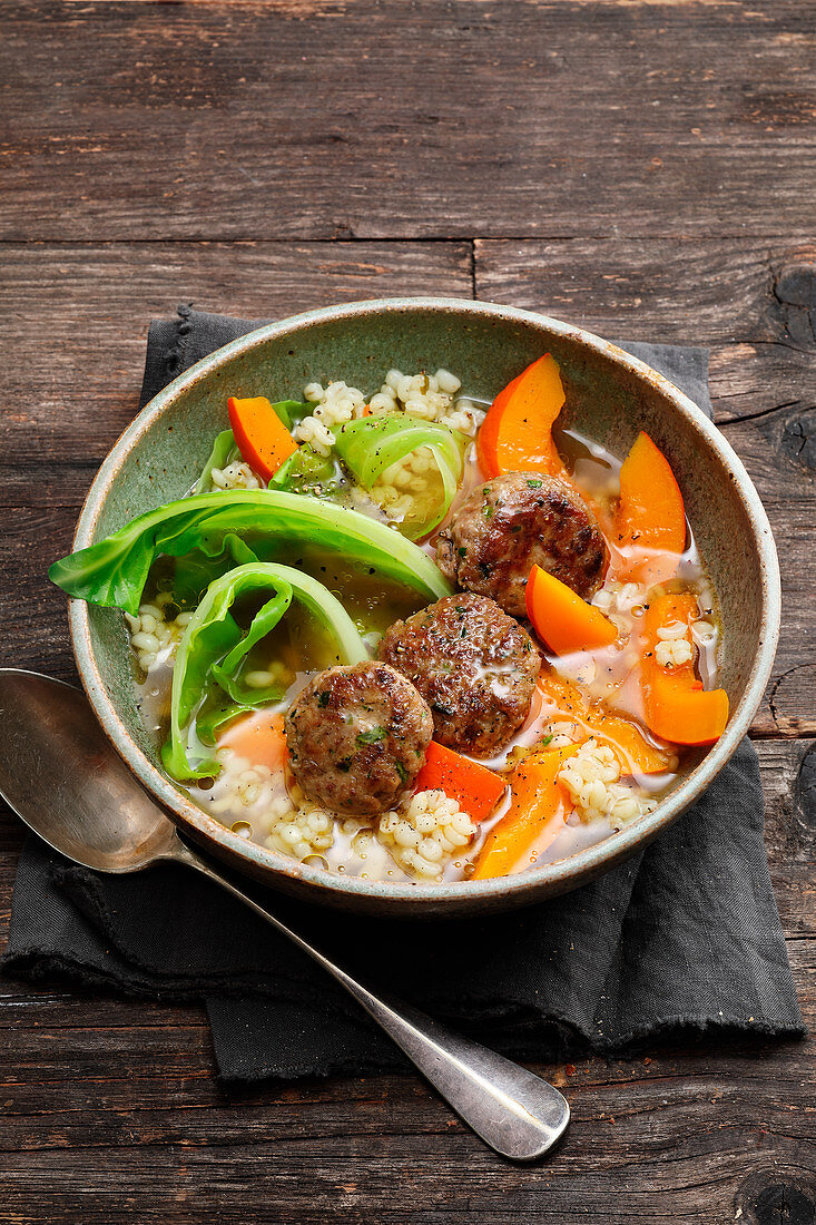 Barley pot with chestnut and wild boar meatballs