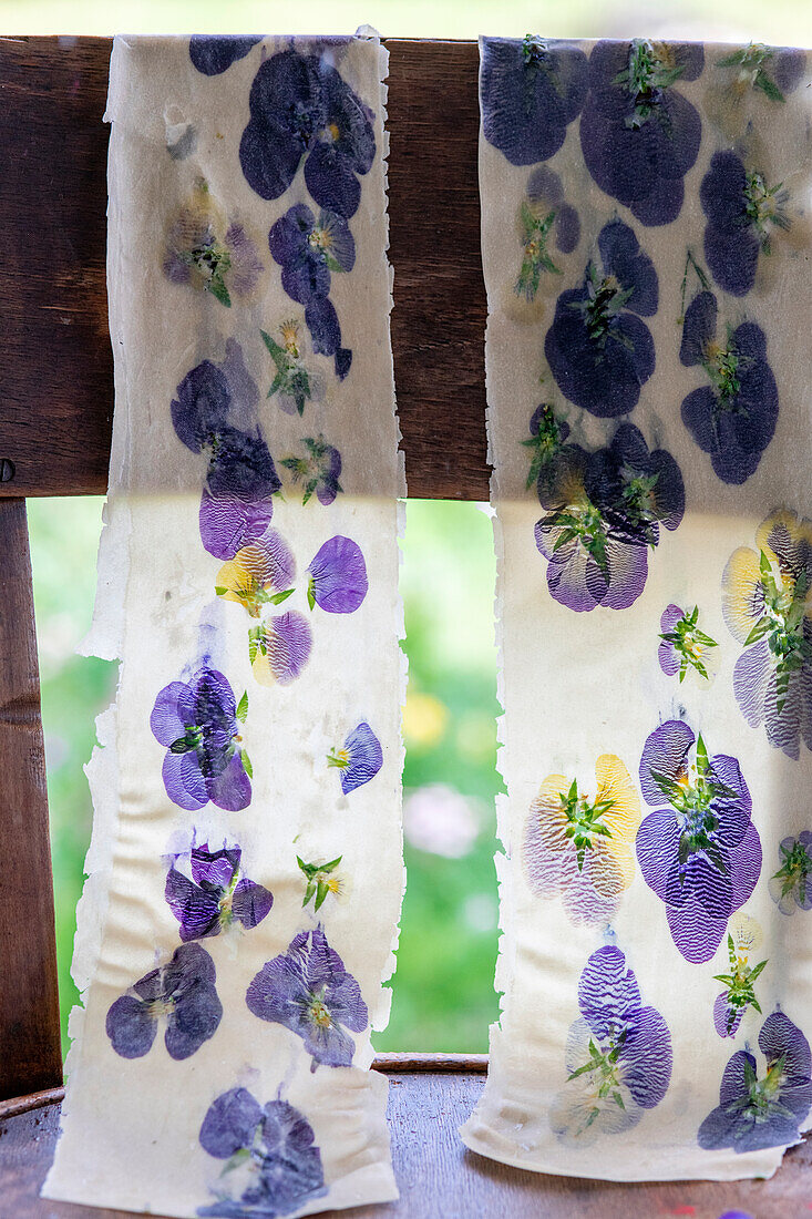 Homemade tagliatelle with edible pansies