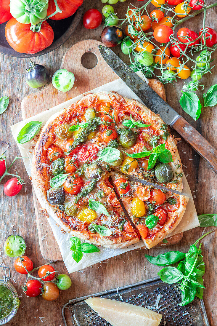 Pizza with colorful cherry tomatoes