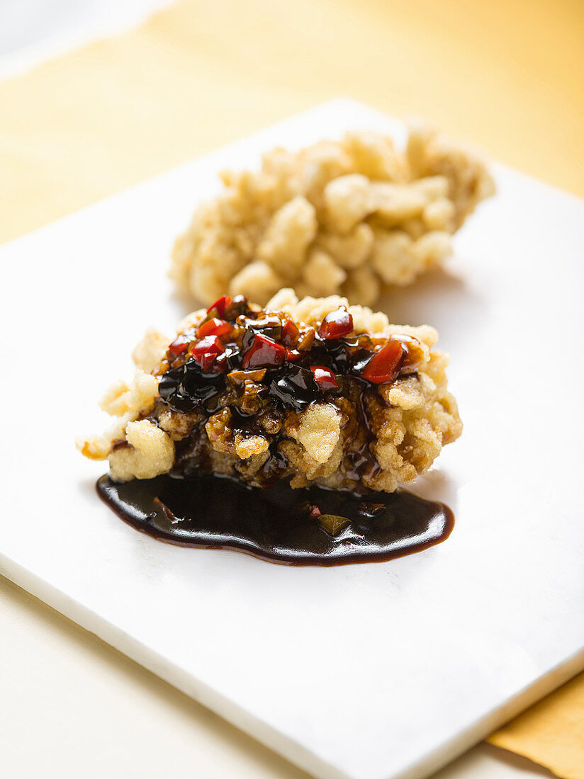 Deep-fried rose fish fillet with a sweet and sour sauce (China)