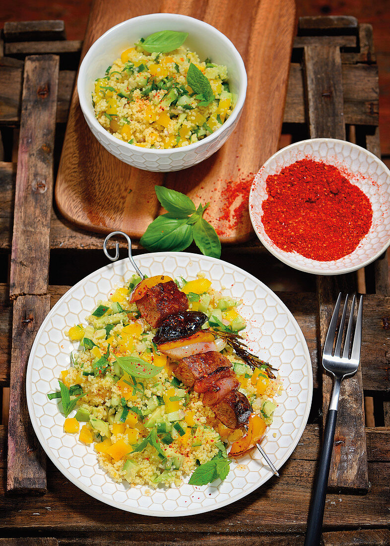 Fruity lamb skewers with a couscous salad