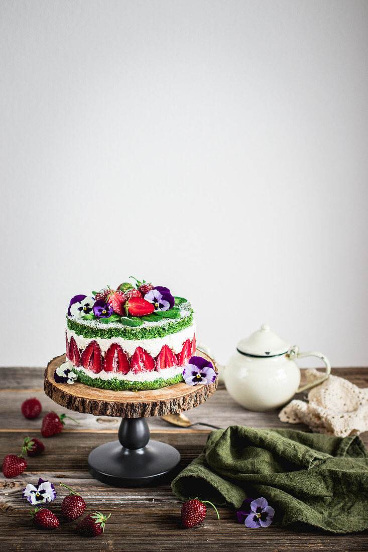 Spinach cake with strawberry cream filling