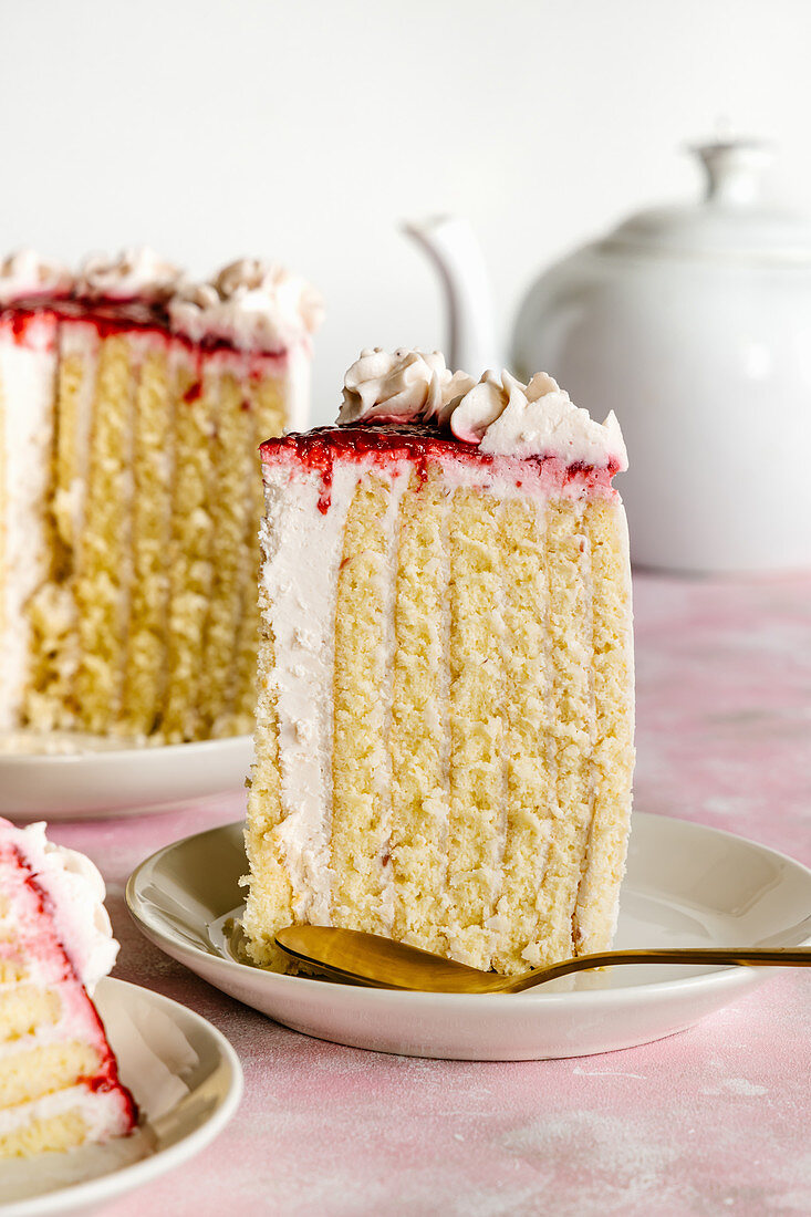 Vanilla and raspberry sponge roll cake