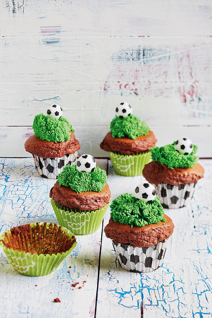 Chocolate muffins with green frosting (football evening)