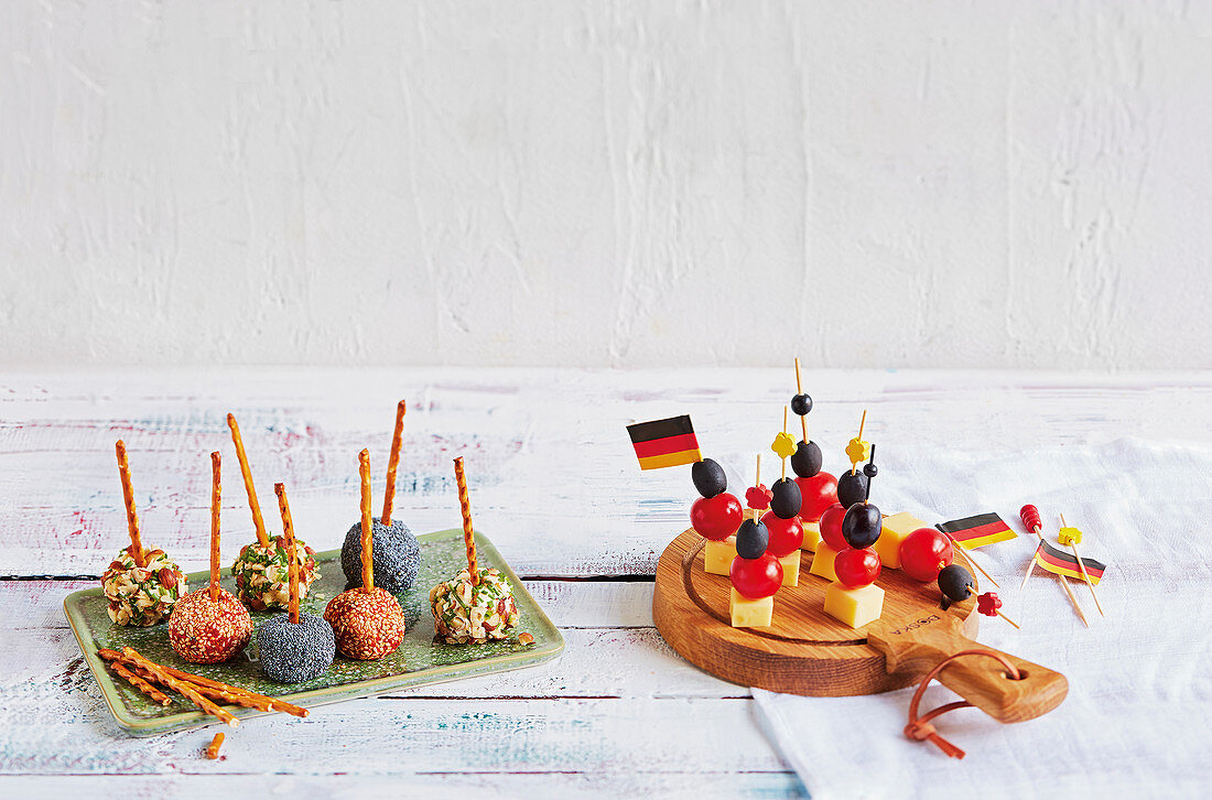 Cream cheese pops and 'black-red-and-gold' cheese sticks (football evening)