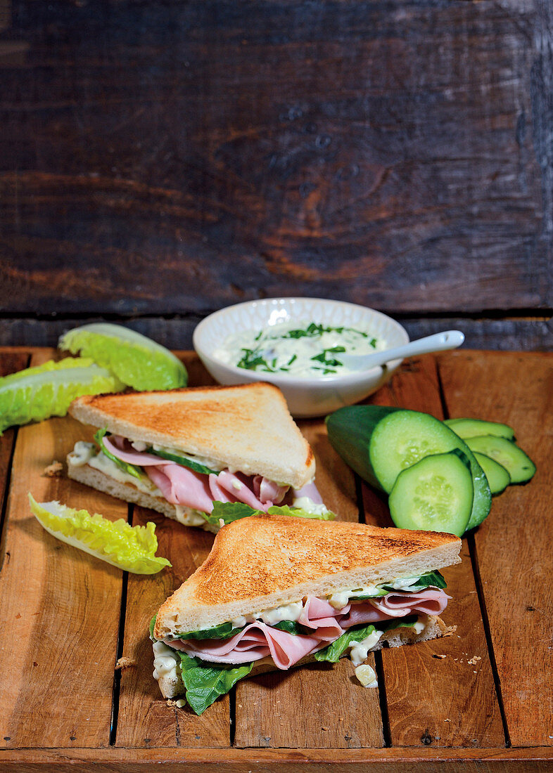 Sandwiches made with cos lettuce, ham, cucumber and remoulade