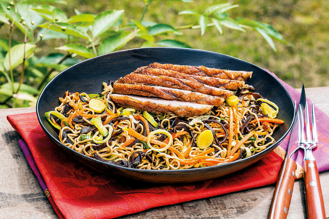 Fried noodles with Chinese morel mushrooms and duck breast
