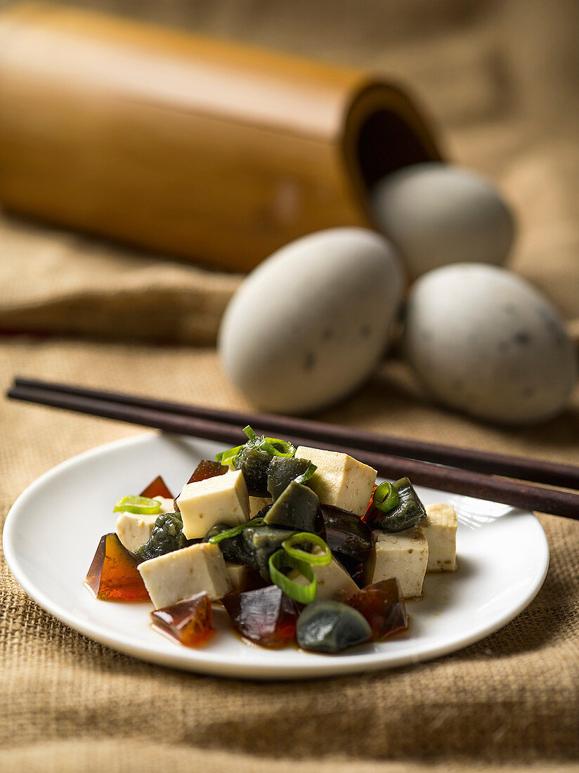 Pidan (thousand year-old eggs) with tofu, China