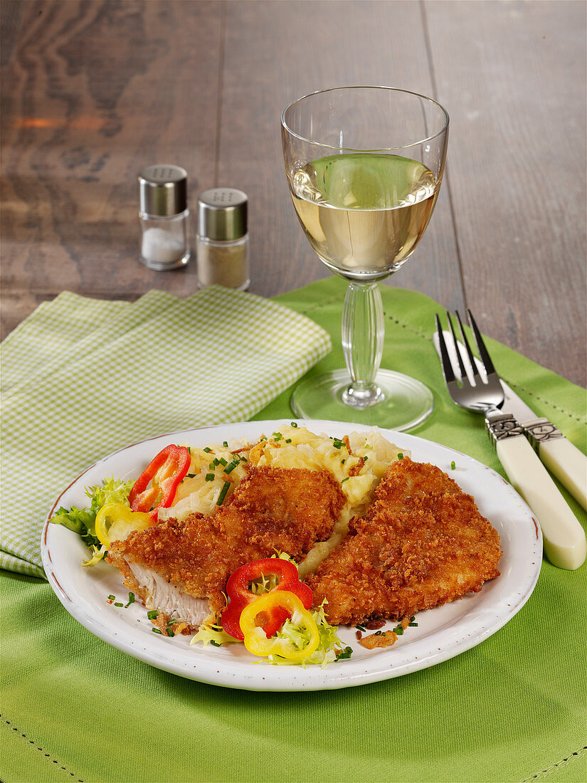 Oven-baked breaded escalope with sauerkraut