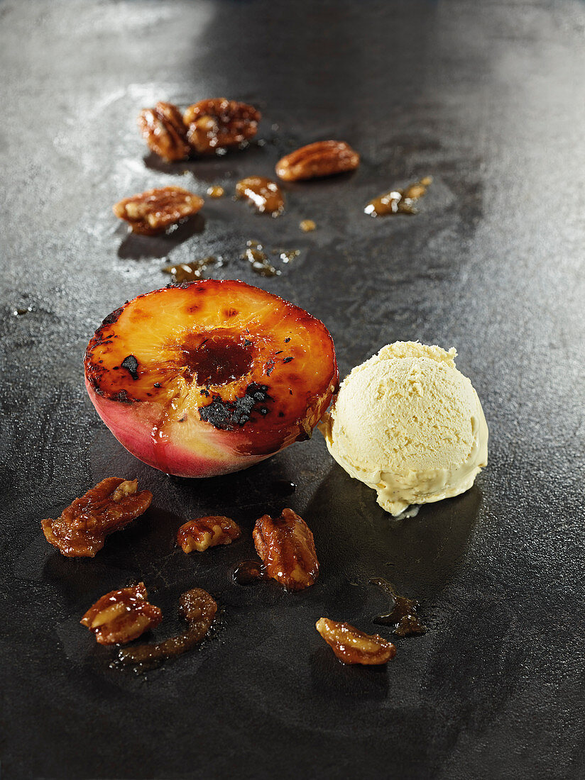 Caramelised peach made in a Beefer with honey and vanilla ice cream