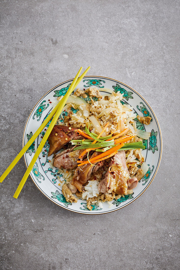 Hangzhou duck confit with egg-fried rice and vegetable ribbons