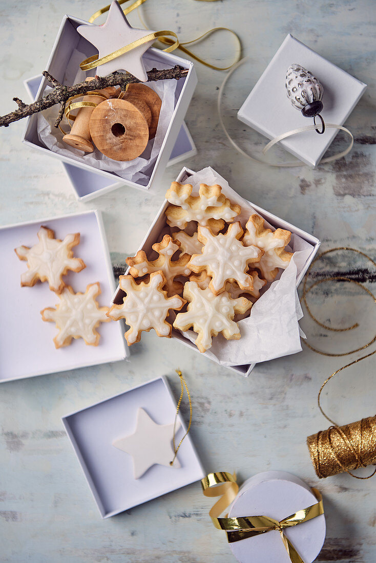 Snowflake-shaped butter biscuits in a gift box