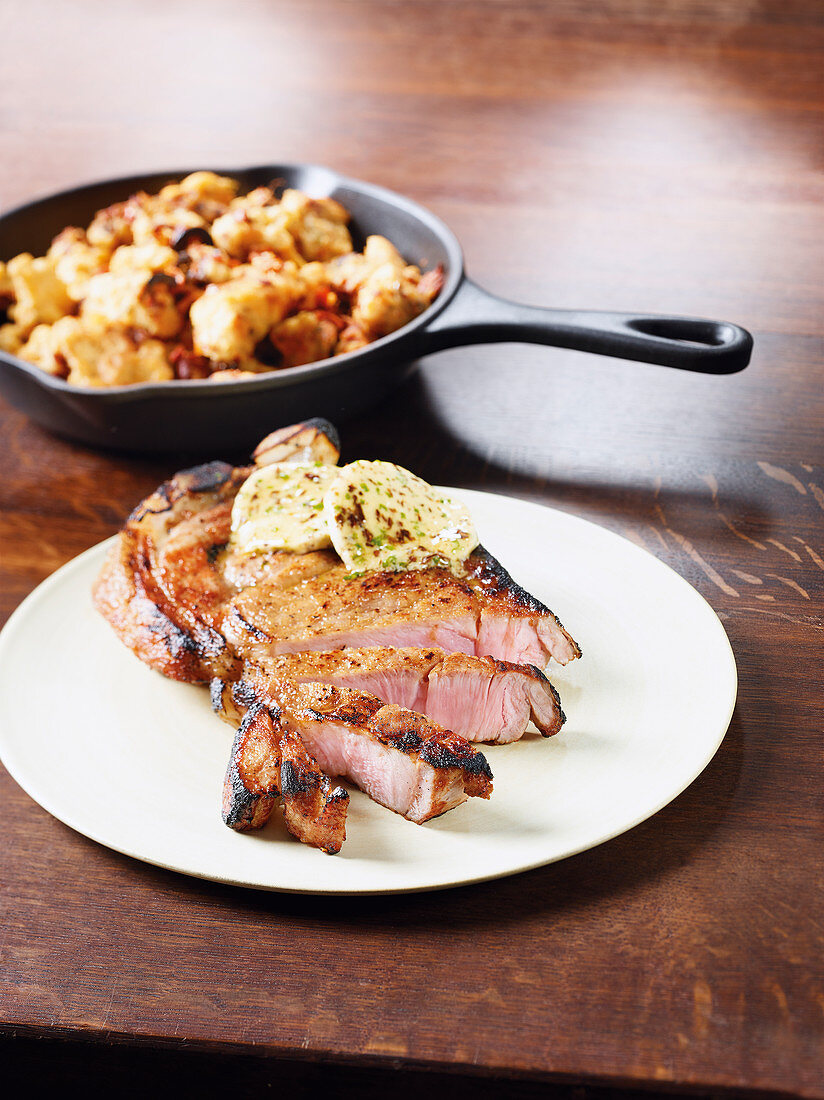 Veal chops made in a Beefer with tomato and olive hash