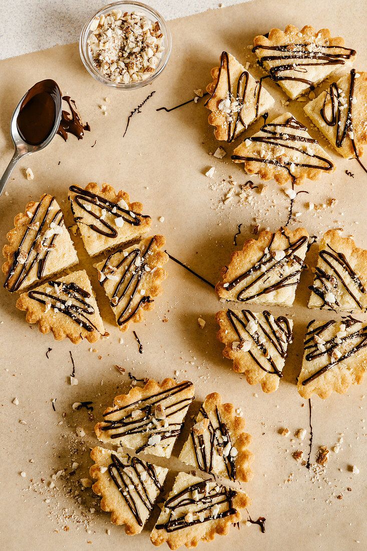 Almond shortbread cookies drizzled with dark chocolate