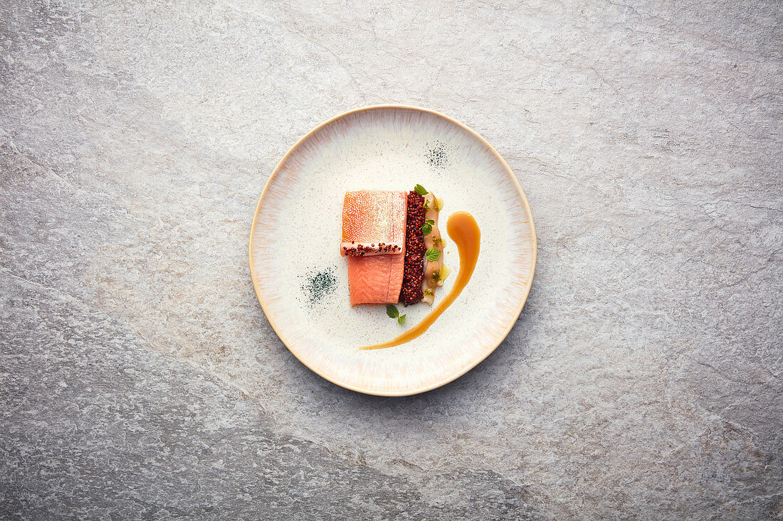 Golden trout with razor clams, red quinoa and sough bread sauce