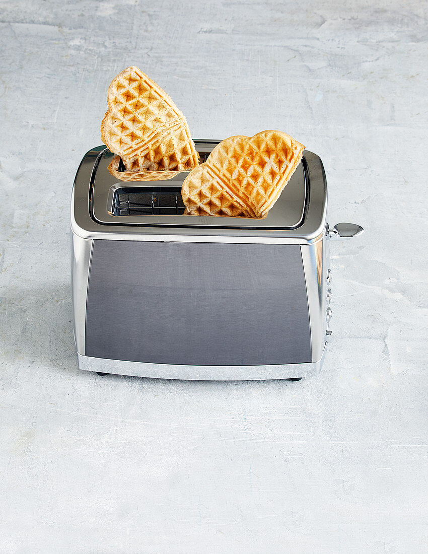 Waffles being defrosted in a toaster