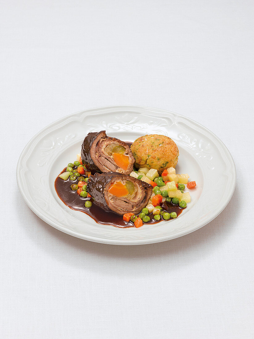 Beef roulade with dumplings and vegetables