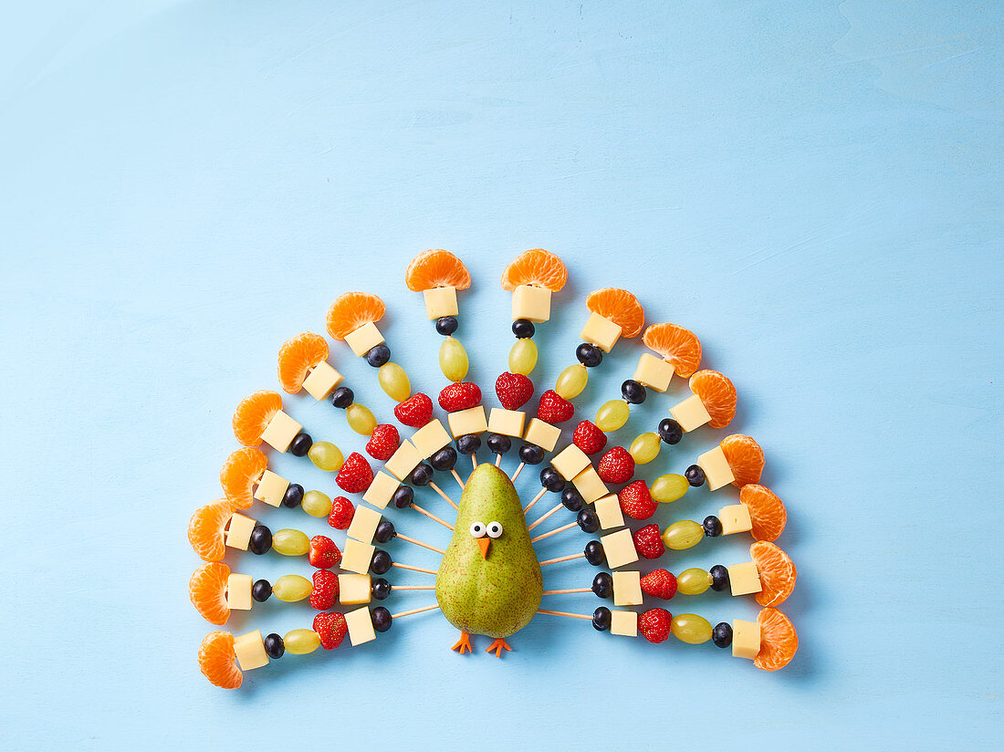 A cheese and fruit party peacock