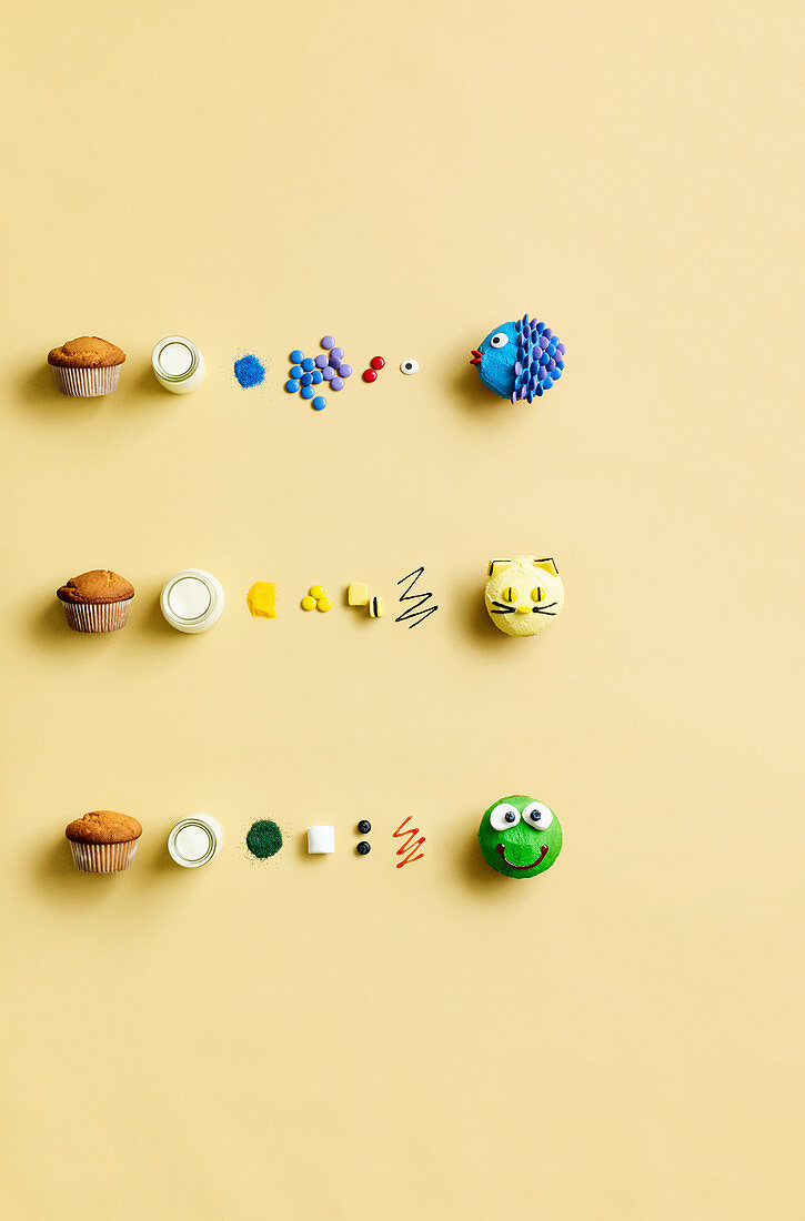 Blue, yellow and green muffin decorations – fish, cat and frog