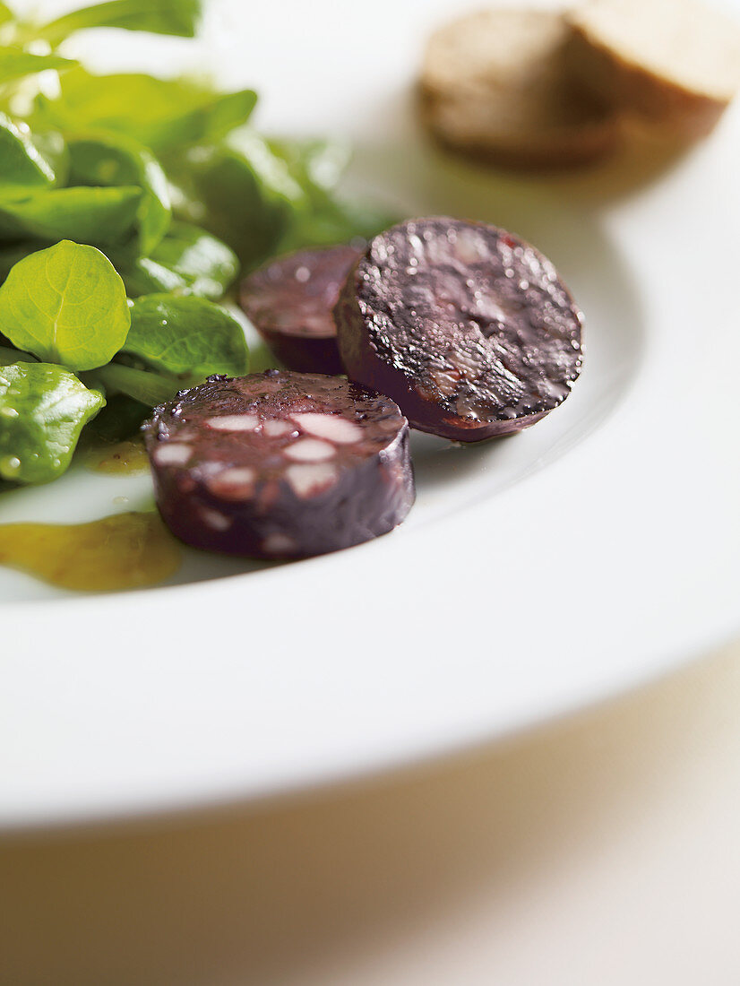 Fried black pudding with lamb's lettuce