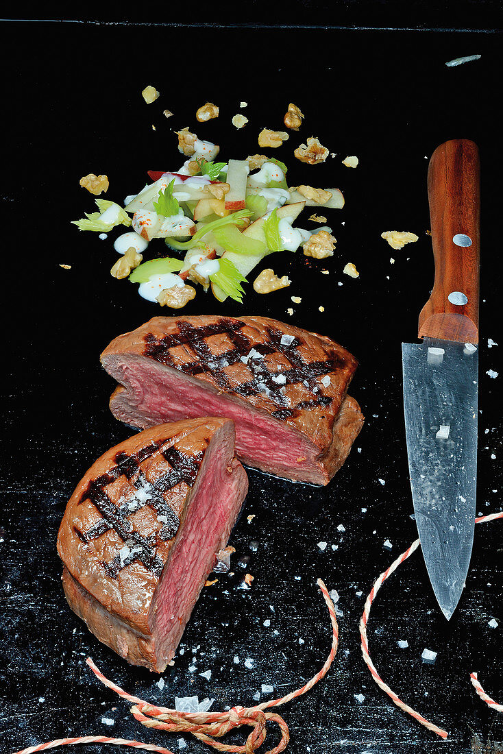 Smoked and grilled fillet steak with an apple and celery salad