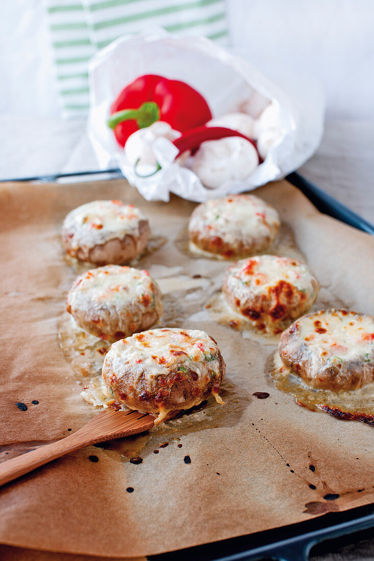 Giant, stuffed mushrooms with mozzarella and melted cheese