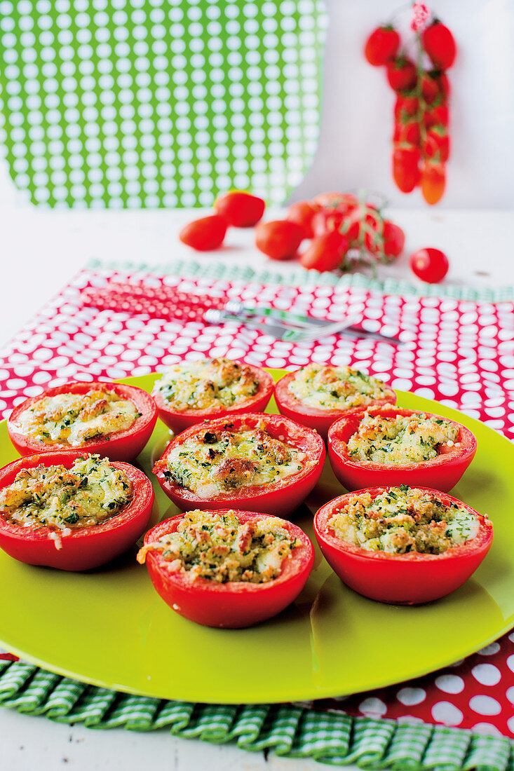 Gratinated tomatoes filled with herbs and mozzarella