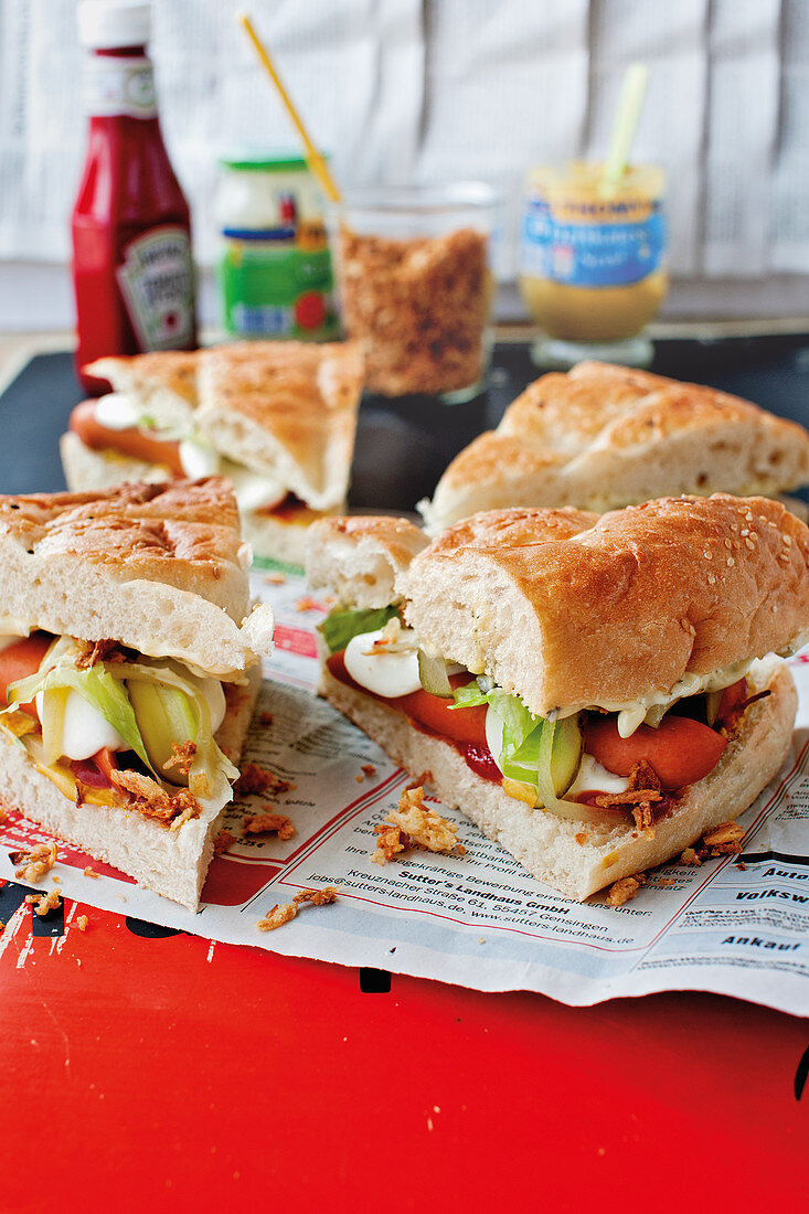 unleavened bread with Frankfurters, lettuce and mozzarella