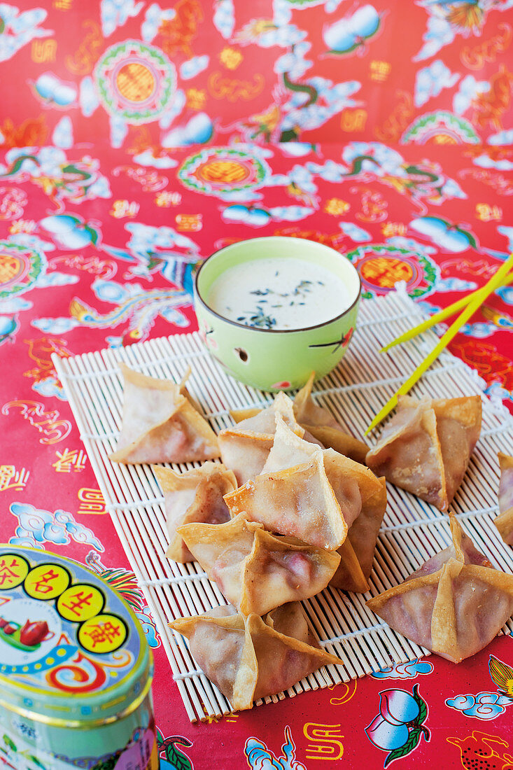 Strawberry wontons with mozzarella and lavender sauce