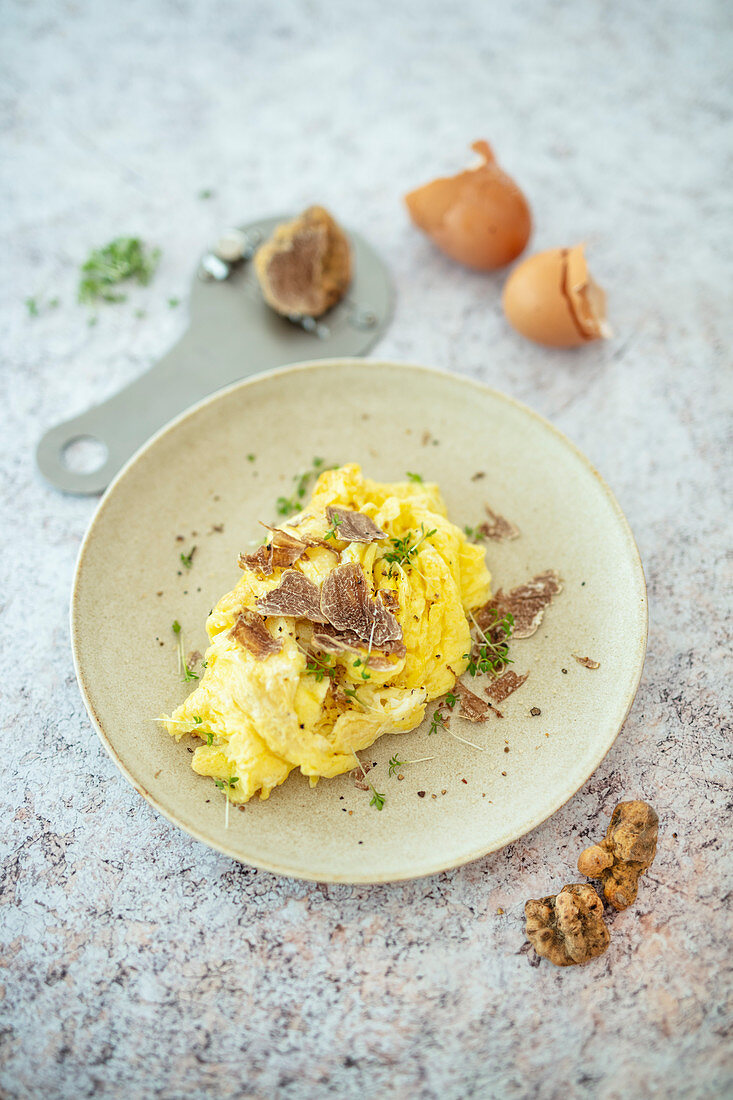 Scrambled egg with white alba truffles from Italy